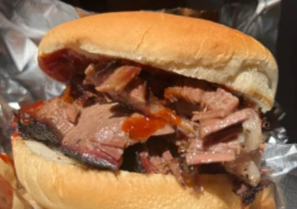 BBQ Sandwiches - Loaded BBQ sandwiches piled high with smoked meats